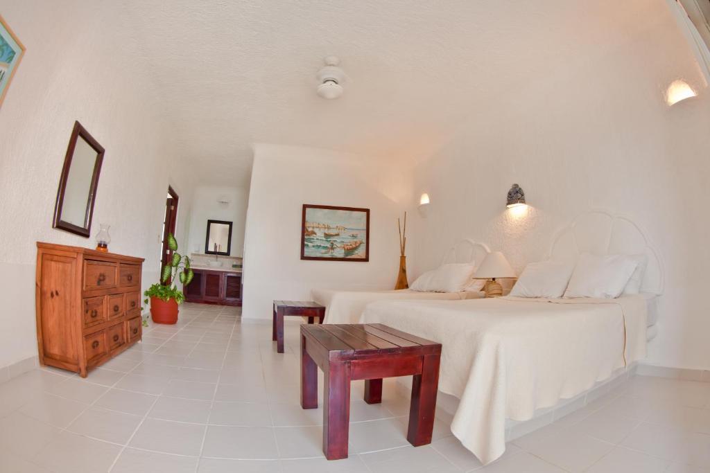 أكومال Villas Flamingo الغرفة الصورة