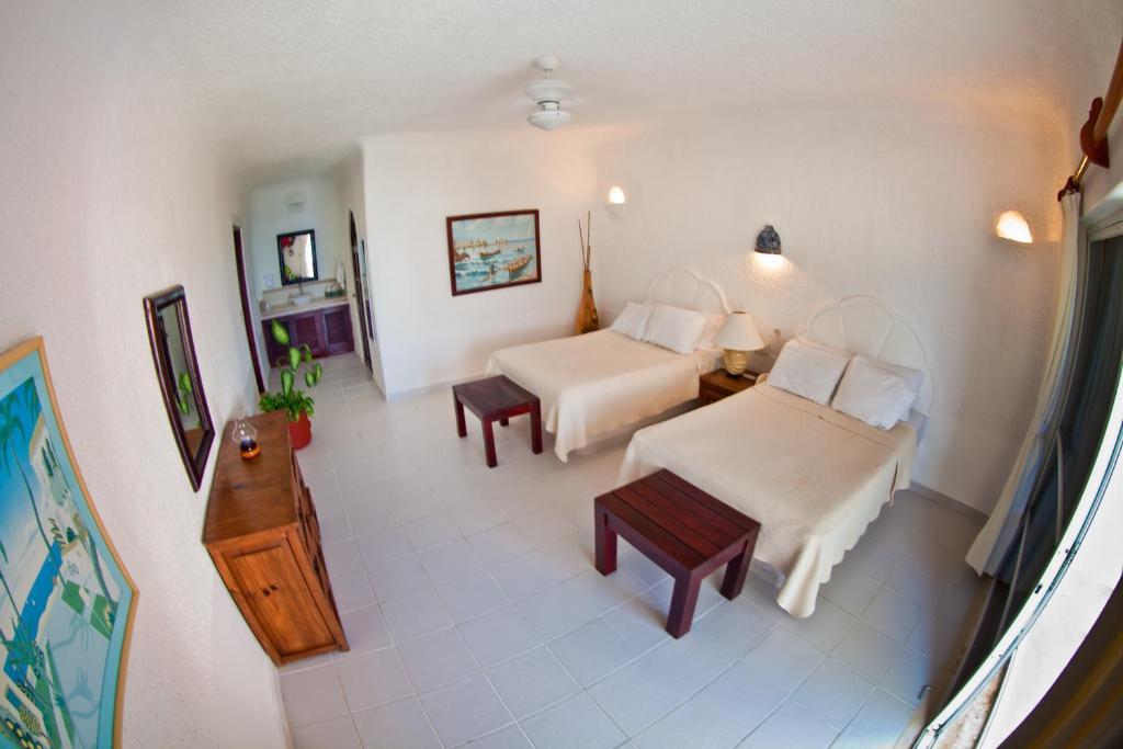 أكومال Villas Flamingo الغرفة الصورة