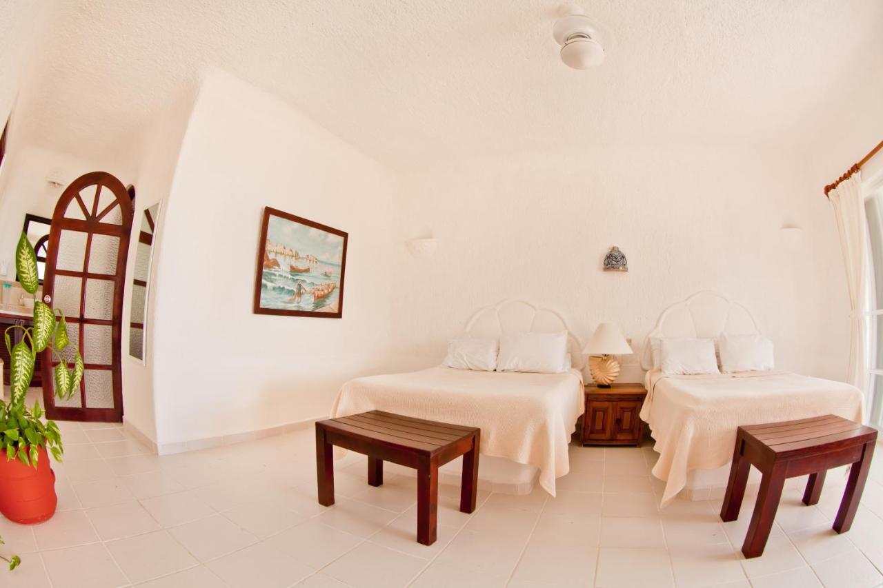 أكومال Villas Flamingo الغرفة الصورة